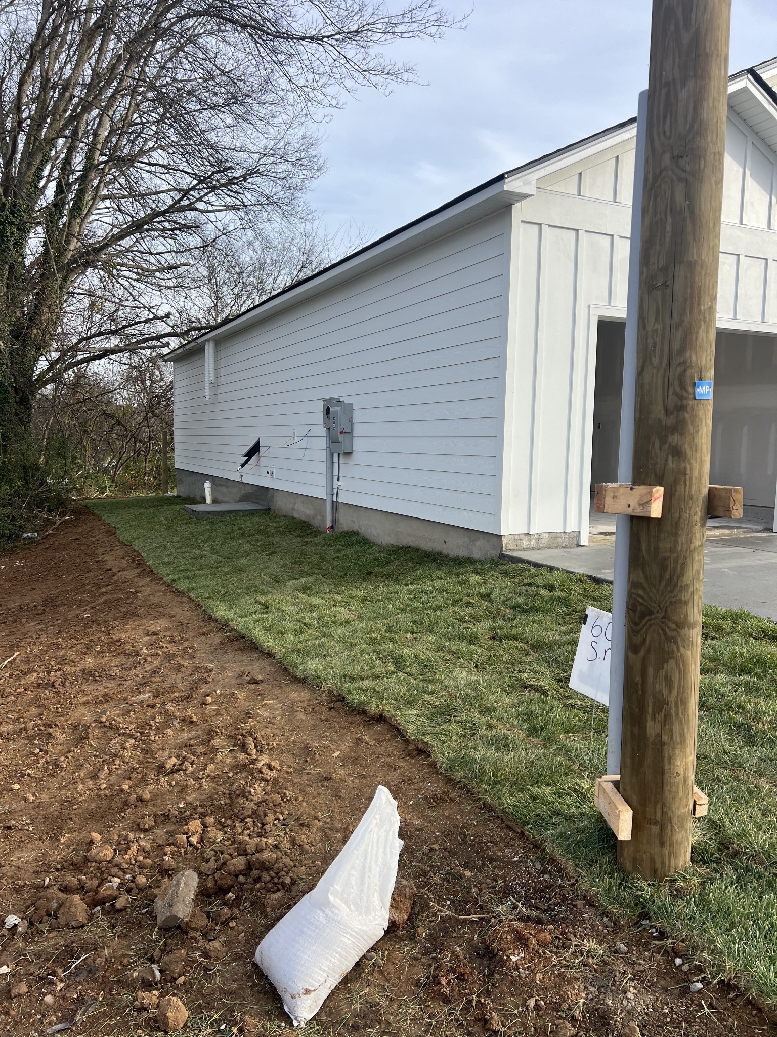 609 South Main Street Mount Pleasant, TN 38474 - Photo 8 of 8 a backyard of a house with lots of green space