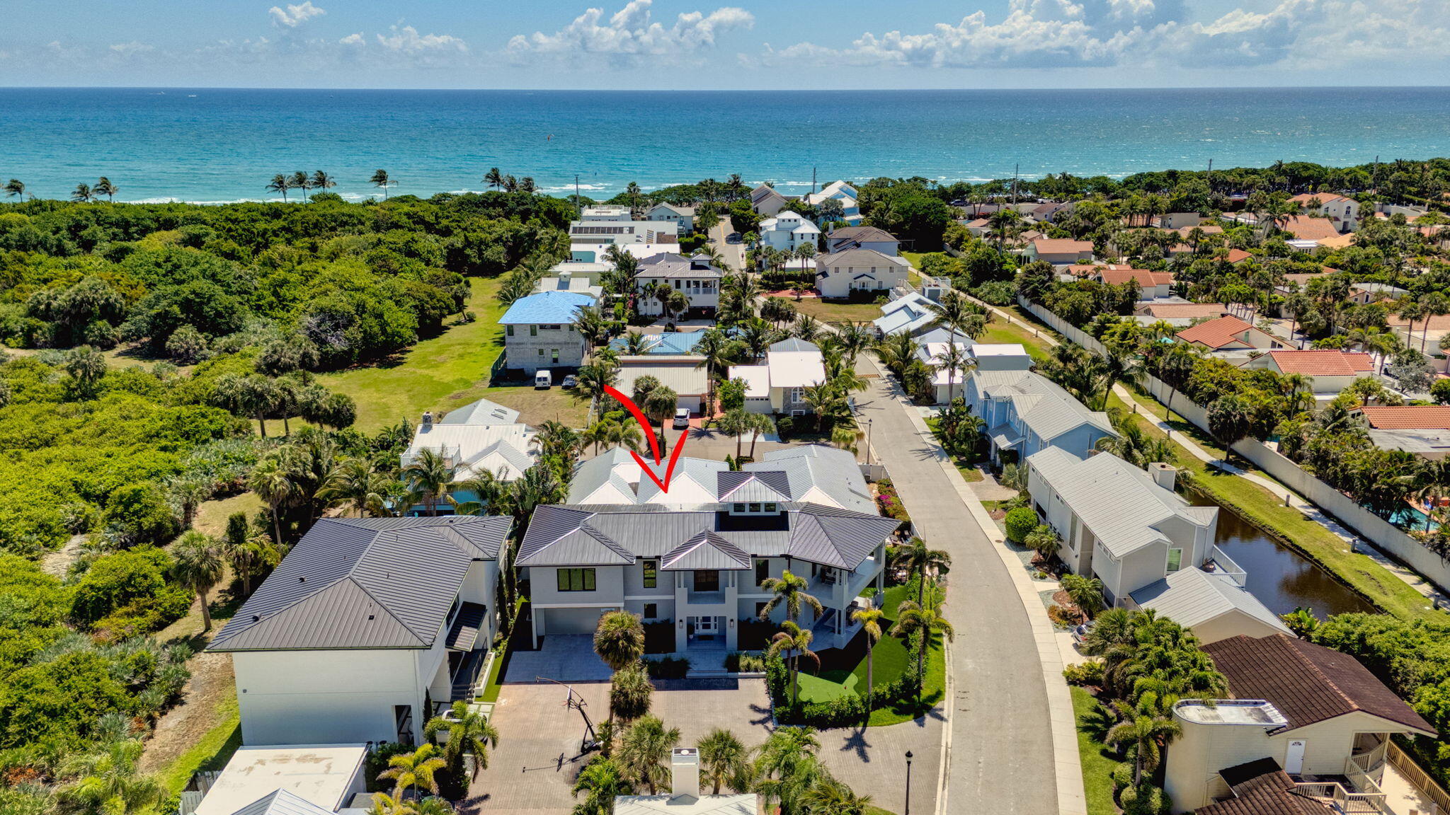 401 Xanadu Place Jupiter, FL 33477 - Photo 2 of 51 89-web-or-mls-DJI_20250506113108_0421_DJ