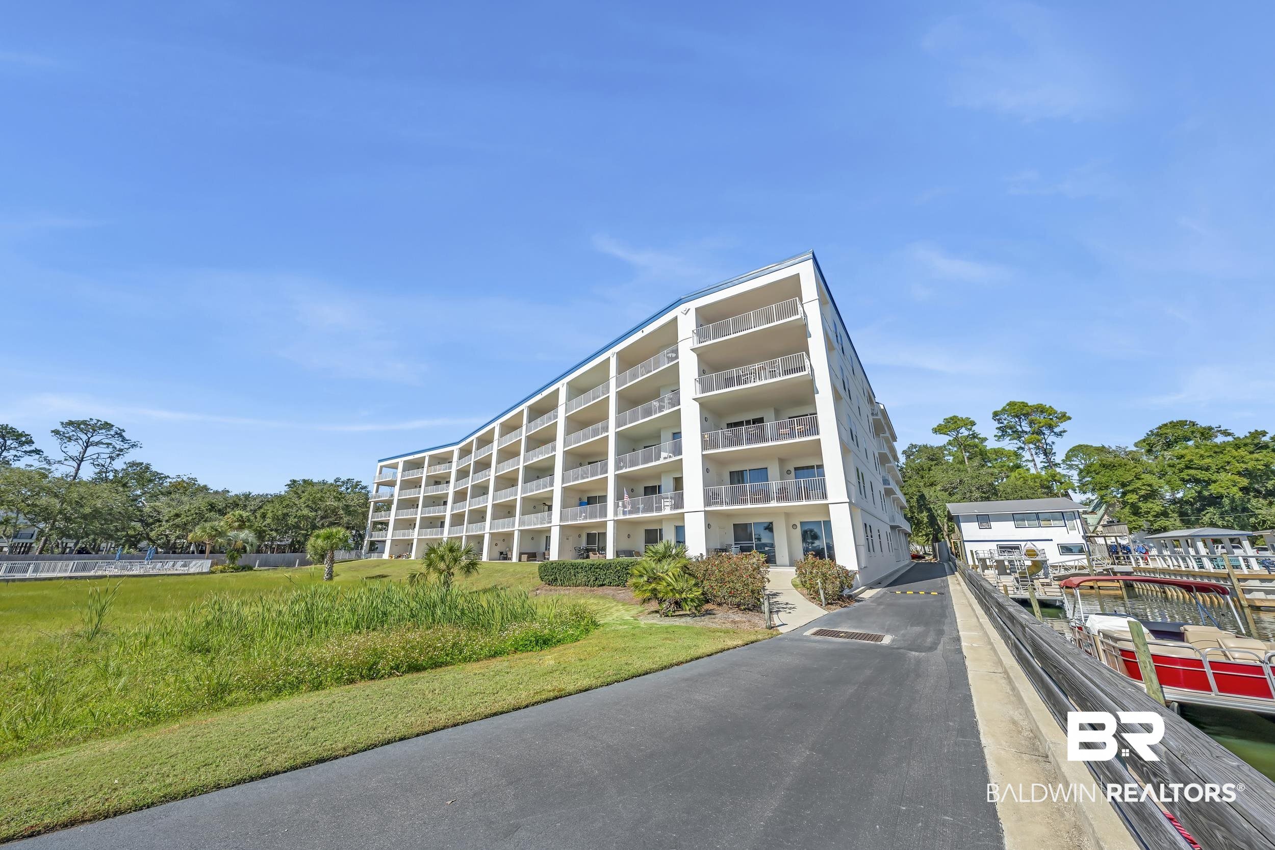 27282 Canal Road, Unit 104 Orange Beach, AL 36561 - Photo 61 of 79 View of apartment building / complex