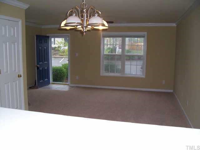 2221 Violet Court Raleigh, NC 27610 - Photo 5 of 9 View from the kitchen/breakfast bar of the combination family/dining room