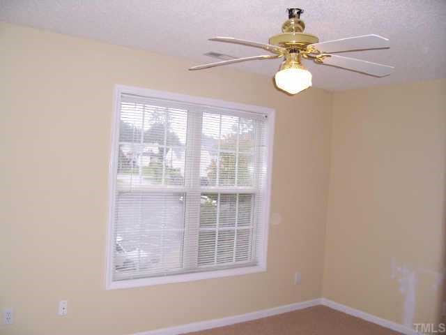 2221 Violet Court Raleigh, NC 27610 - Photo 9 of 9 Master suite #2 has new ceiling fans, carpet & paint