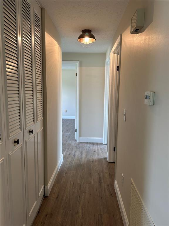 60 Greenleaf Drive Cheswick, PA 15024 - Photo 13 of 29 a view of a hallway with wooden floor and closet