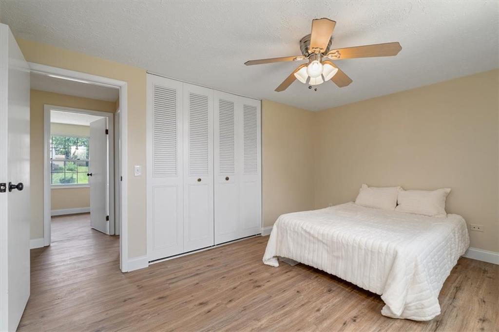 60 Greenleaf Drive Cheswick, PA 15024 - Photo 15 of 29 a bedroom with a bed and wooden floor