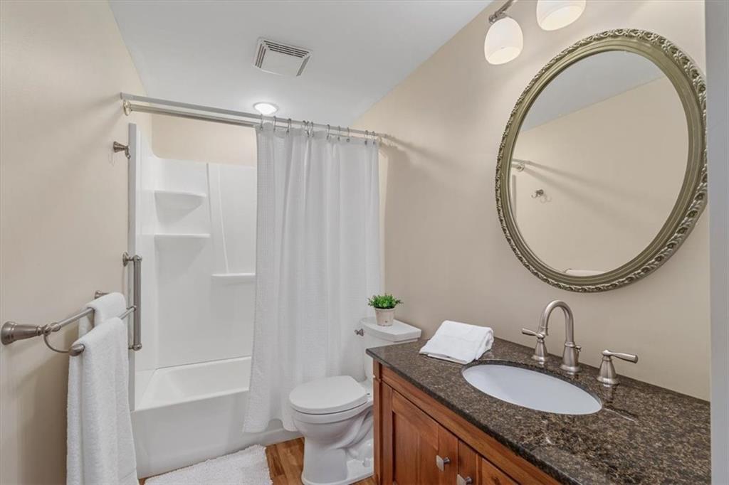 60 Greenleaf Drive Cheswick, PA 15024 - Photo 19 of 29 a bathroom with a granite countertop sink mirror vanity and a toilet