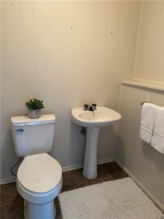 60 Greenleaf Drive Cheswick, PA 15024 - Photo 23 of 29 a white toilet sitting next to a bathroom sink