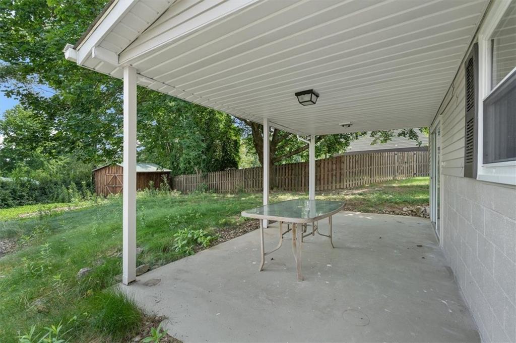 60 Greenleaf Drive Cheswick, PA 15024 - Photo 26 of 29 a view of a chair and tables in the backyard