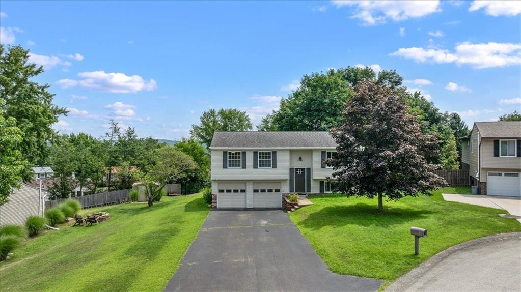 60 Greenleaf Drive Cheswick, PA 15024 - Photo 3 of 29 a front view of a house with a yard