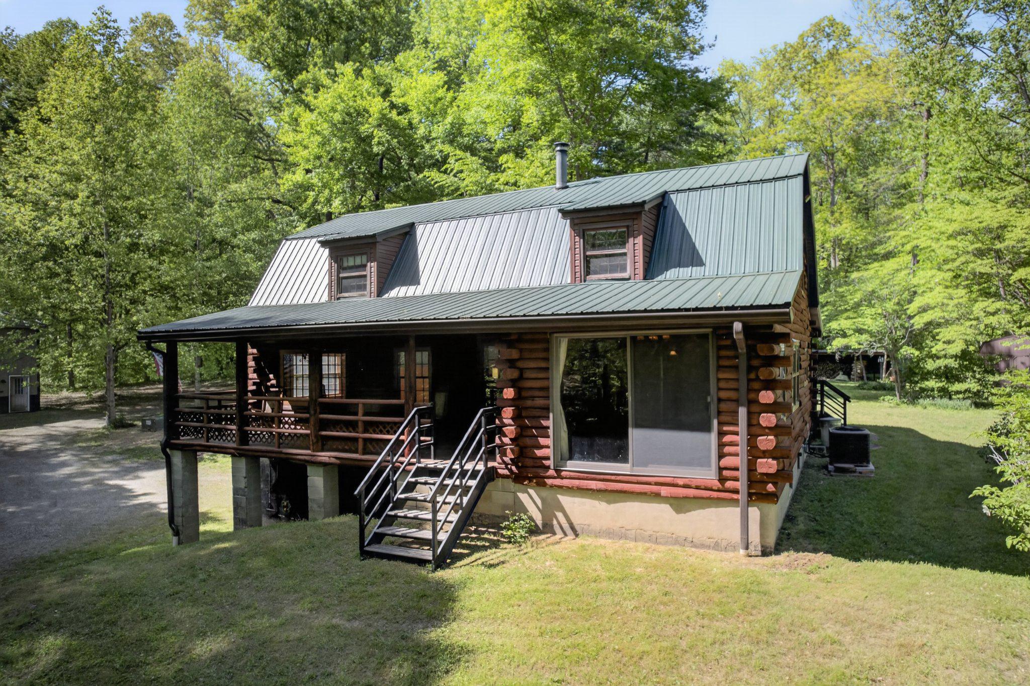 403 Union Church Road Townsend, DE 19734 - Photo 7 of 73 Charming log cabin nestled in nature.