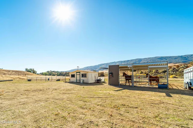 a view of a living room and a balcony