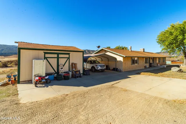 a view of an ocean with a mountain