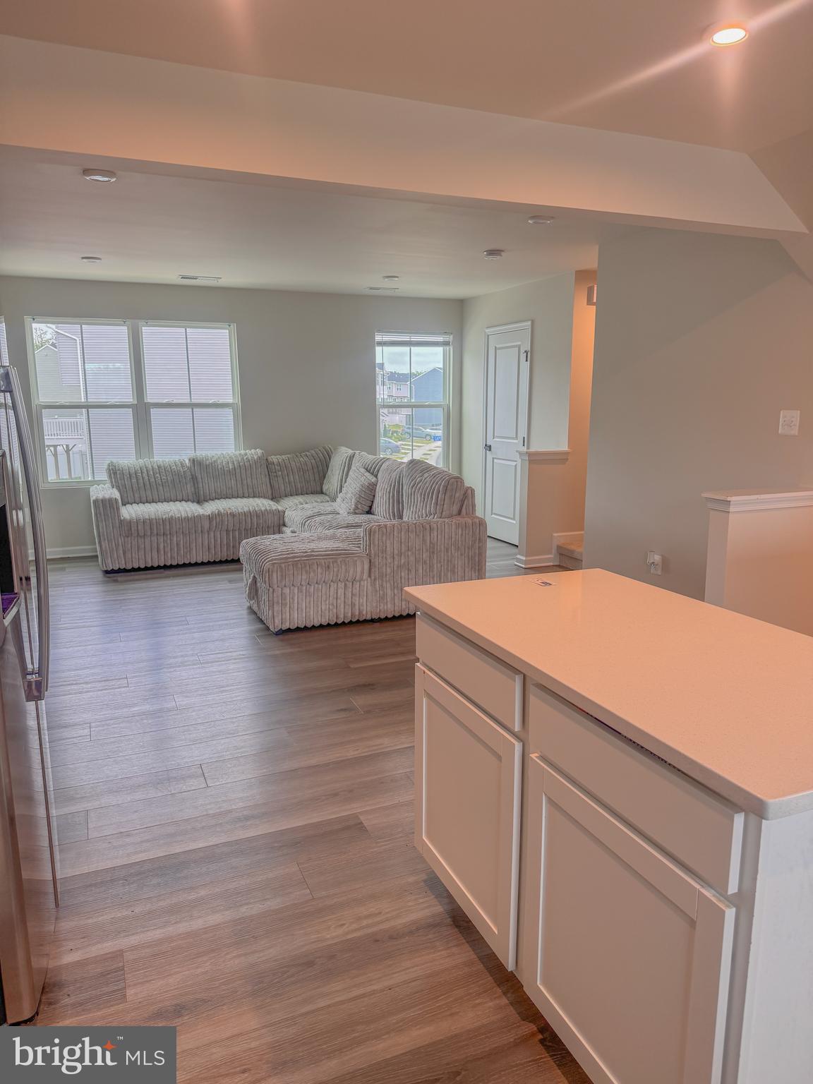18240 Capital Court Ruther Glen, VA 22546 - Photo 14 of 29 living room view from kitchen
