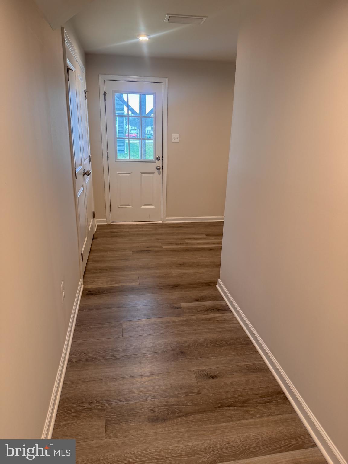 18240 Capital Court Ruther Glen, VA 22546 - Photo 4 of 29 lower level with access to the backyard
