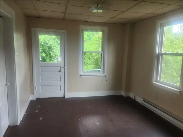 an empty room with windows