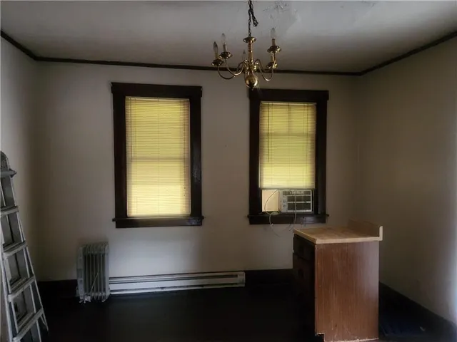 a room with window and a wooden floor