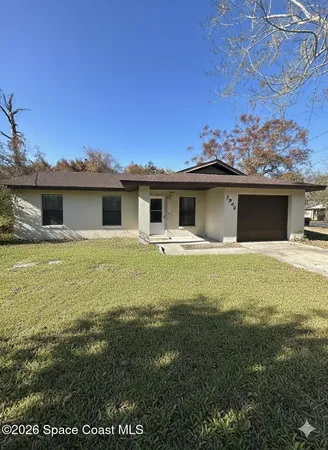 a view of a house with a swimming pool