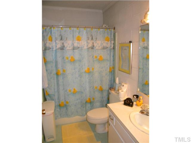 1426 Trinity Circle Raleigh, NC 27607 - Photo 11 of 12 Full Bathroom in seperate lower level apartment suite. 2 bedrooms in this lower level with a seperate side entrance from the main house.