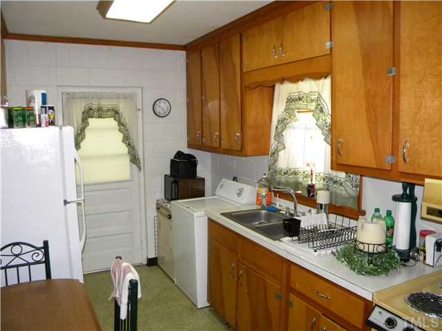 1426 Trinity Circle Raleigh, NC 27607 - Photo 12 of 12 Seperate kitchen in the apartment suite located in the basement of the house with seperate entrance from main house.