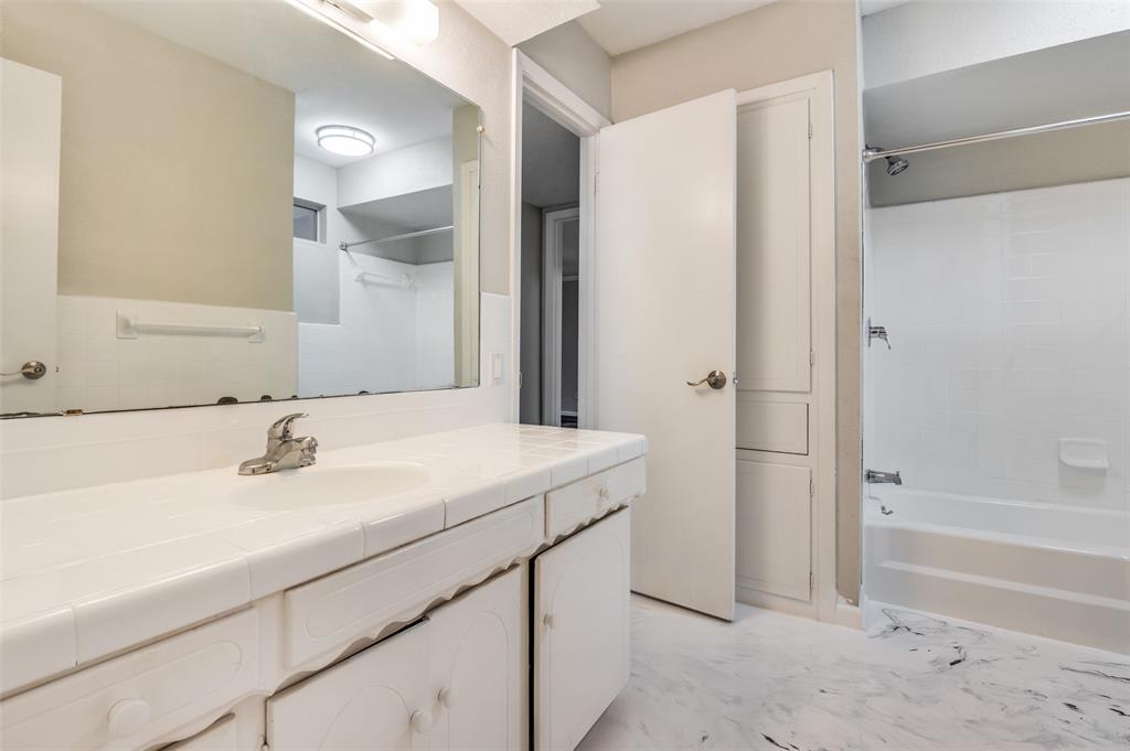 2244 Homeway Circle Dallas, TX 75228 - Photo 11 of 12 Full bath with vanity and shower / tub combination