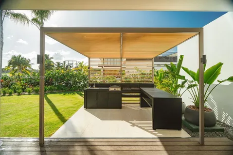 a living room with large windows
