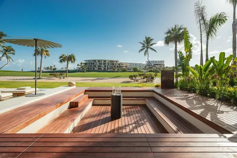 a view of swimming pool with outdoor seating