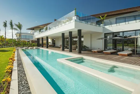 a view of a patio with swimming pool table and chairs