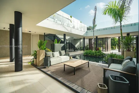 a patio with a table and chairs