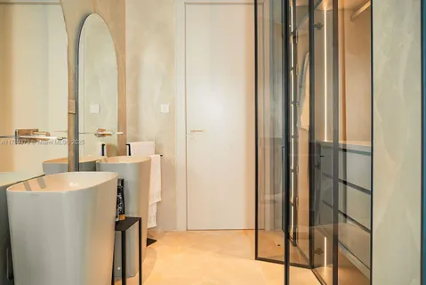 a bathroom with a tub and sink