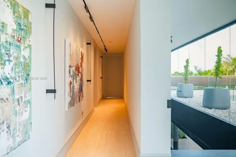 a view of a bathroom from the hallway