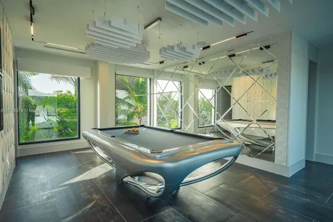 a room with gym equipment and a large window