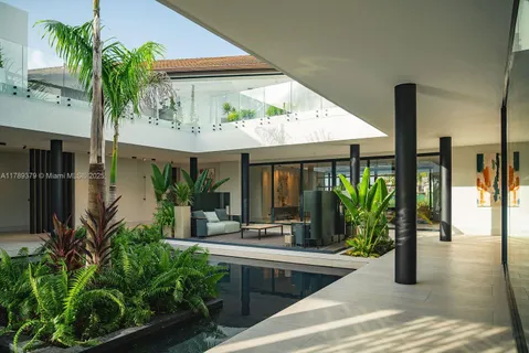 a potted plant sitting in front of a building