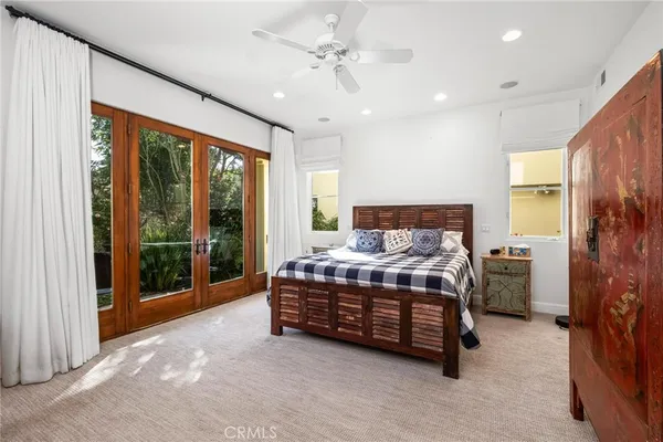 a spacious bathroom with a tub and a shower