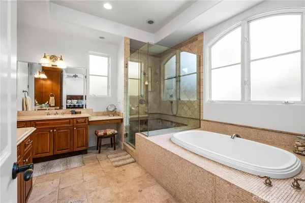 a bedroom with a bed and dresser