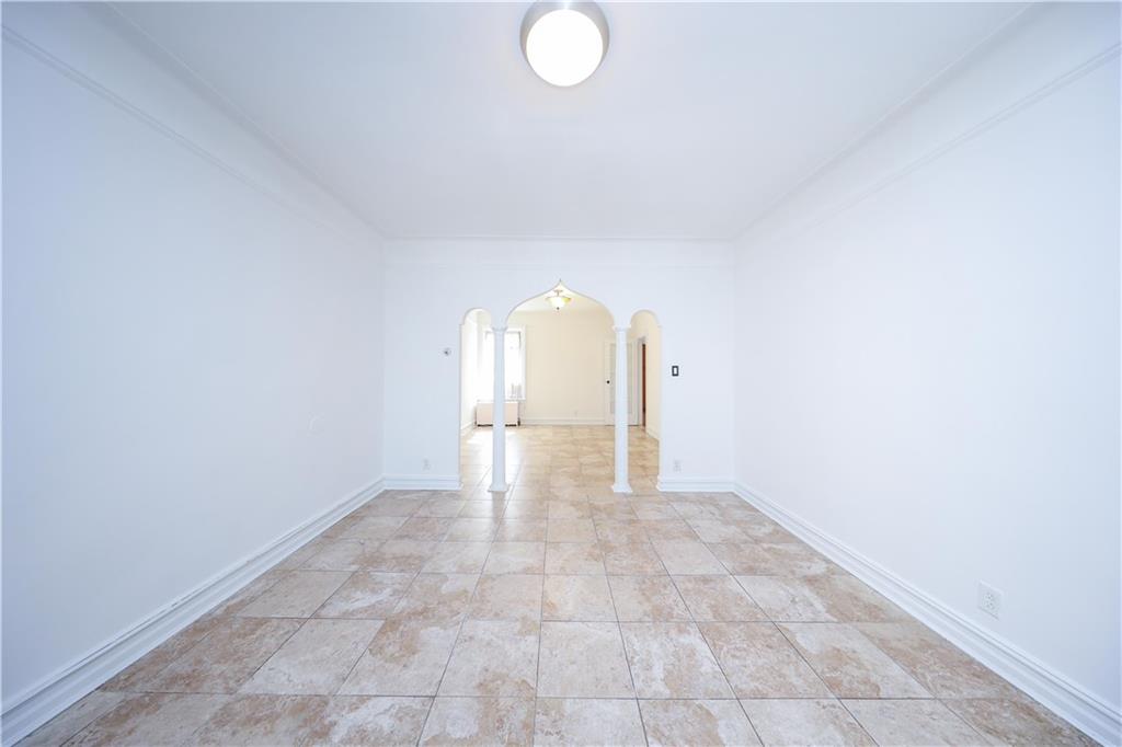 196 Quentin Road Brooklyn, NY 11223 - Photo 23 of 29 an empty room with windows