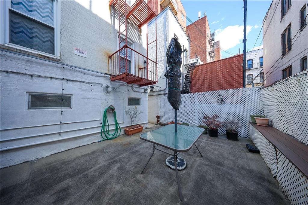 196 Quentin Road Brooklyn, NY 11223 - Photo 25 of 29 a two couches sitting in front of a building