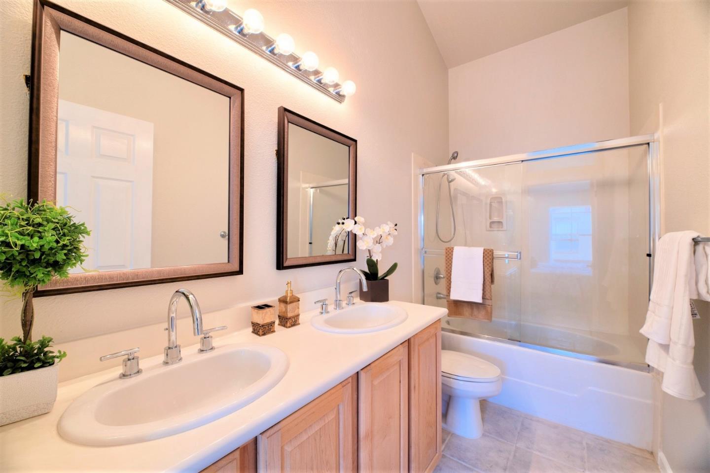 3111 White Riesling Place San Jose, CA 95135 - Photo 17 of 24 a bathroom with a sink toilet and shower