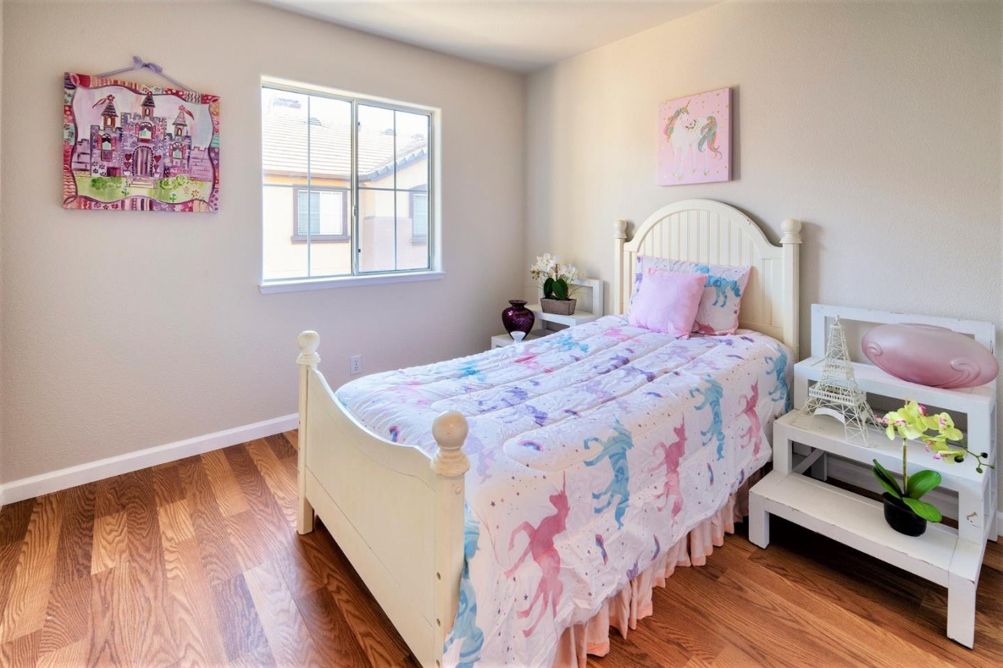 3111 White Riesling Place San Jose, CA 95135 - Photo 18 of 24 a bedroom with bed and wooden floor