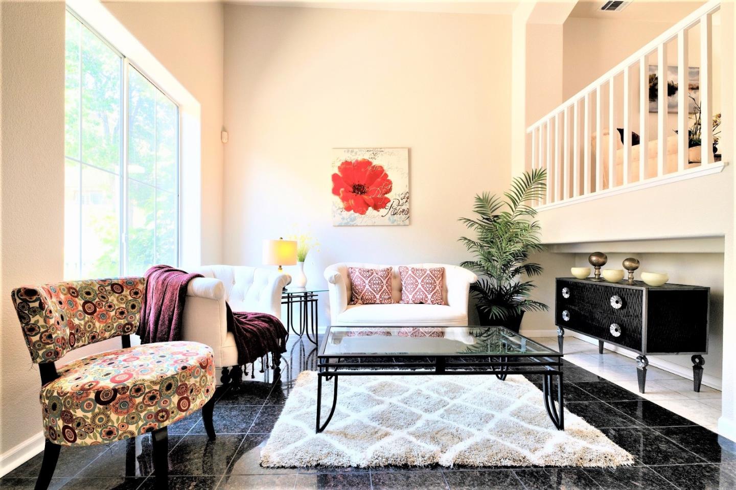 3111 White Riesling Place San Jose, CA 95135 - Photo 4 of 24 a living room with furniture and a fireplace