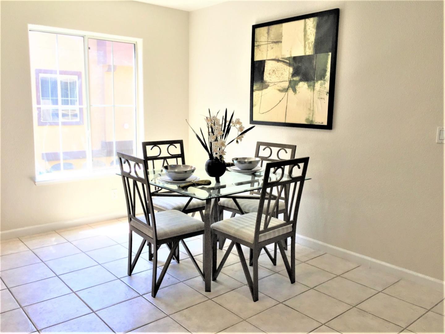 3111 White Riesling Place San Jose, CA 95135 - Photo 9 of 24 a view of a dining room with furniture and window