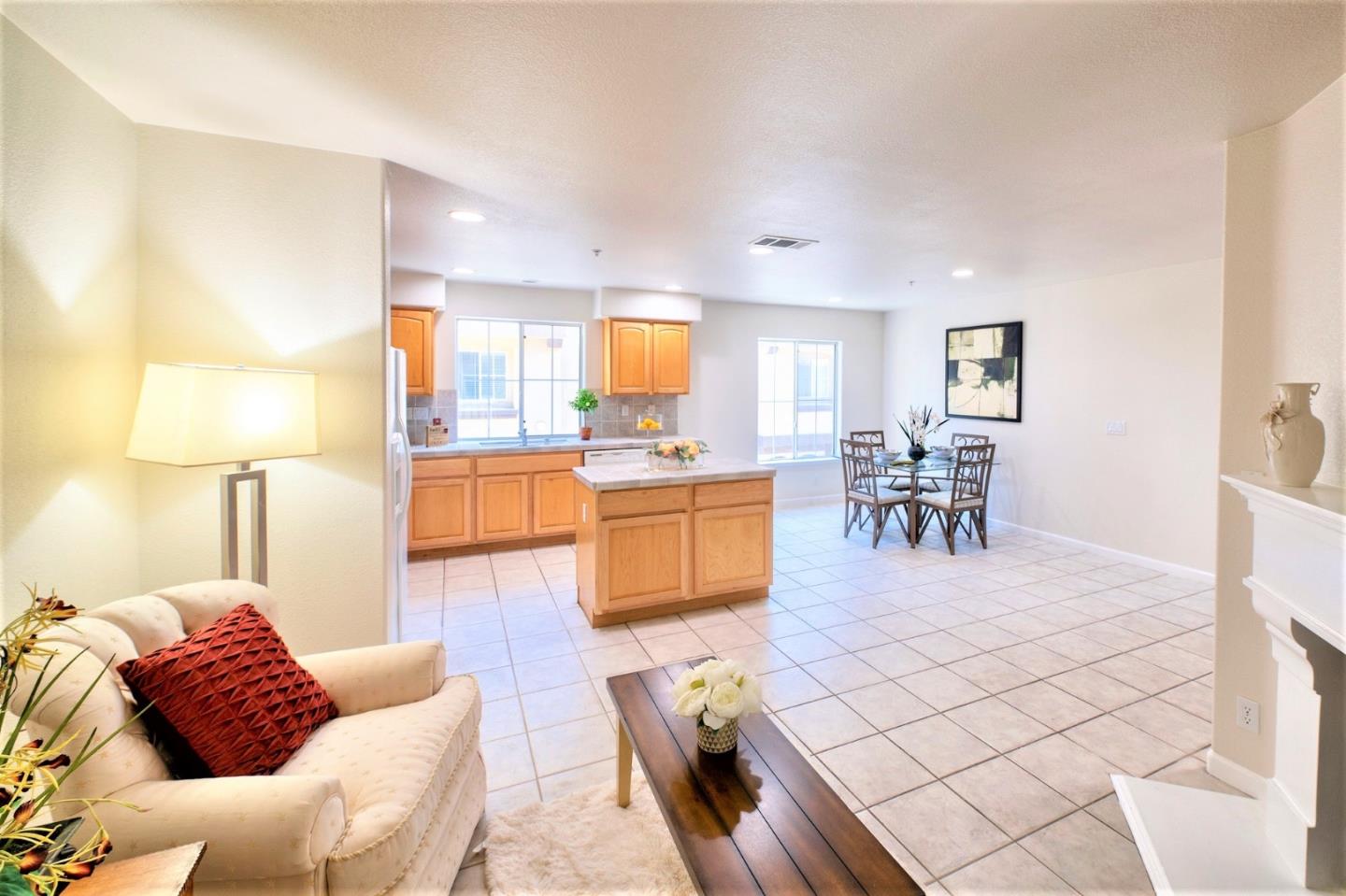 3111 White Riesling Place San Jose, CA 95135 - Photo 10 of 24 a living room with furniture and a table