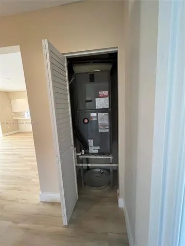 a view of a kitchen from the hallway