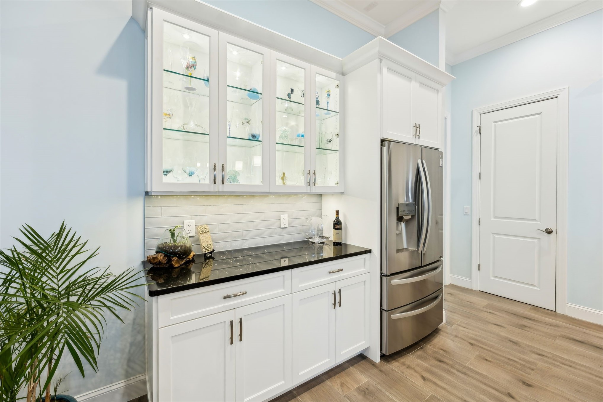 96029 Brady Point Road Fernandina Beach, FL 32034 - Photo 13 of 61 a kitchen with stainless steel appliances a refrigerator and a hard wood floor