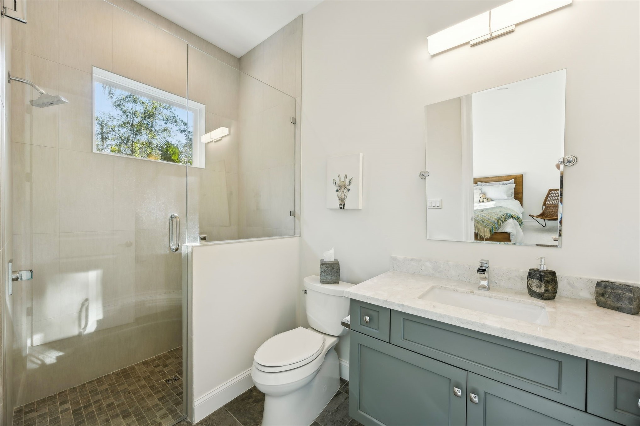 96029 Brady Point Road Fernandina Beach, FL 32034 - Photo 31 of 61 a bathroom with a sink a toilet and shower