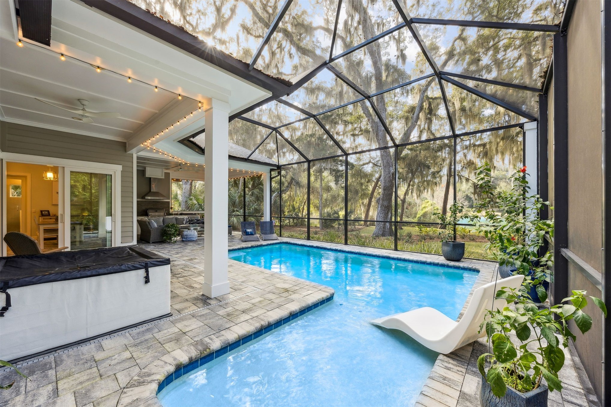 96029 Brady Point Road Fernandina Beach, FL 32034 - Photo 37 of 61 a living room with furniture and floor to ceiling window