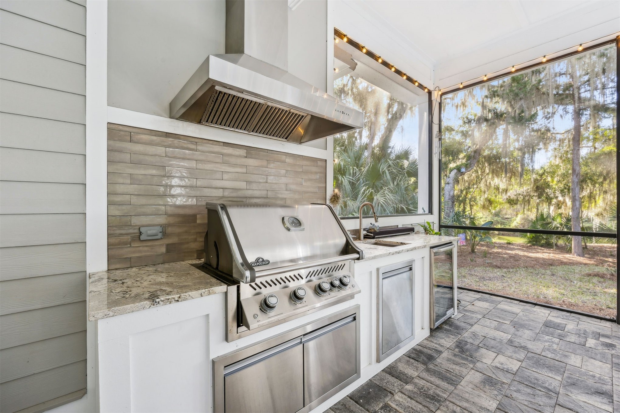 96029 Brady Point Road Fernandina Beach, FL 32034 - Photo 39 of 61 a kitchen with a stove and a microwave