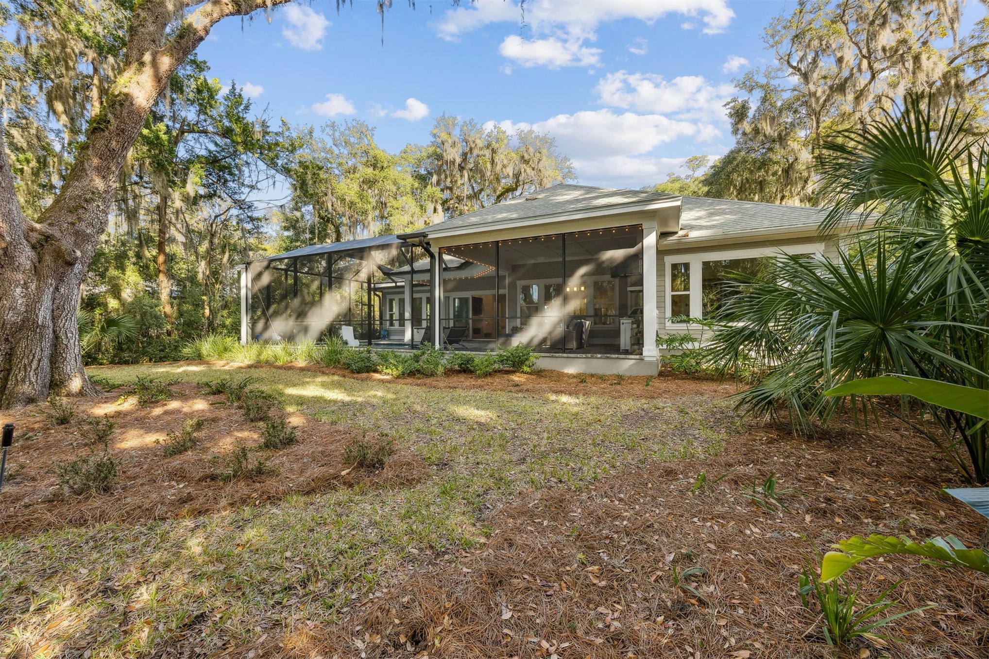 96029 Brady Point Road Fernandina Beach, FL 32034 - Photo 46 of 61 a view of a house with a tree