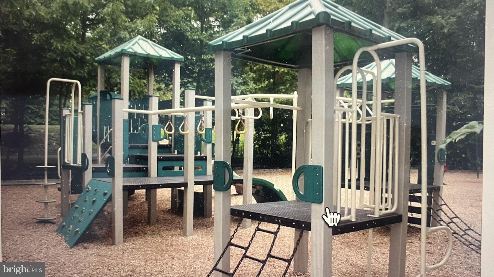 8616 Fire Rock Road Laurel, MD 20724 - Photo 21 of 24 Playground fun in a wooded retreat.