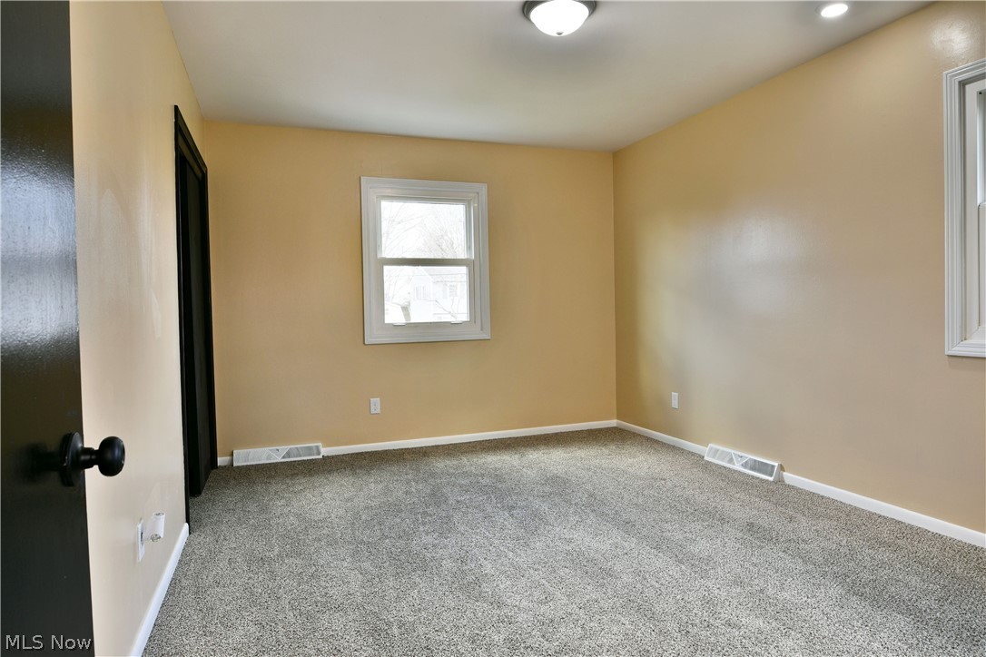 105 Fairview Avenue Cortland, OH 44410 - Photo 33 of 47 Carpeted empty room with baseboards