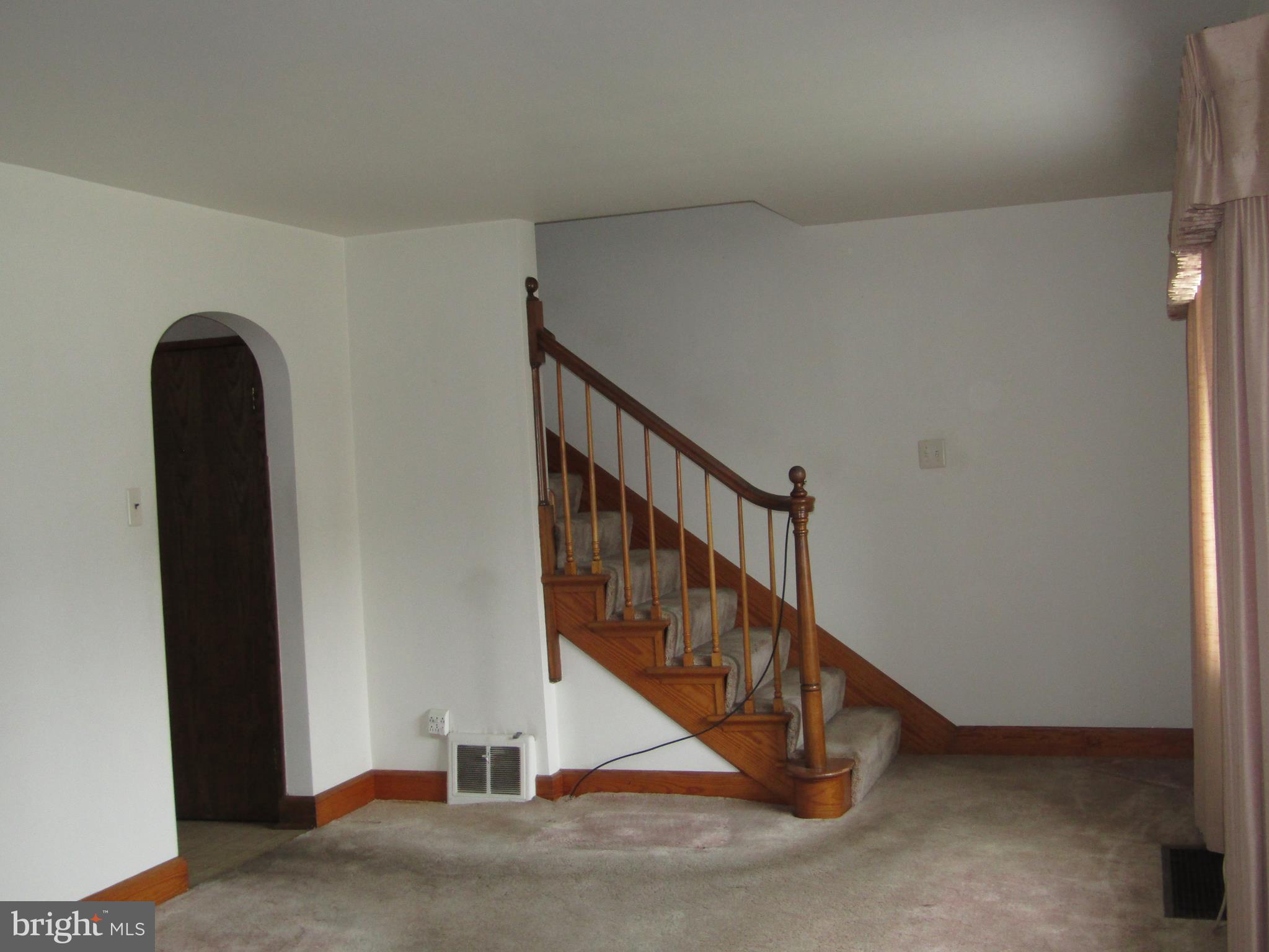212 Princess Street Hanover, PA 17331 - Photo 3 of 33 Living Room (Archway to Kitchen)