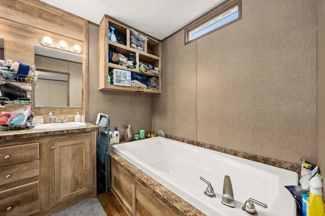a utility room with a sink dryer and washer