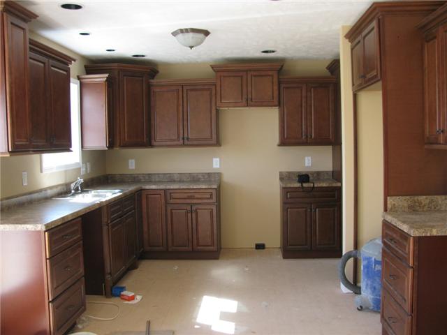 2901 Porterfield Road Readyville, TN 37149 - Photo 6 of 16 Cabinets galore in this country kitchen, also has a pantry.